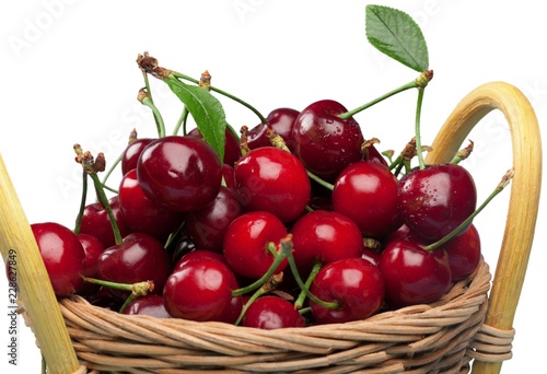 Ripe sweet cherries isolated on white