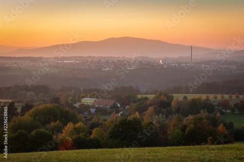 Nice sunset on small city Velesin, Czech landscape