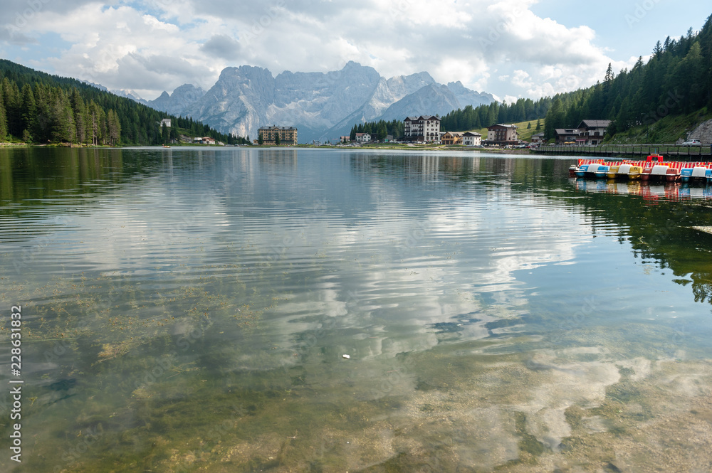 The calm waters of Lake Misurina in the Italian Dolomites, just before sunset. The calm waters of Lake Misurina in the Italian Dolomites, just before sunset.