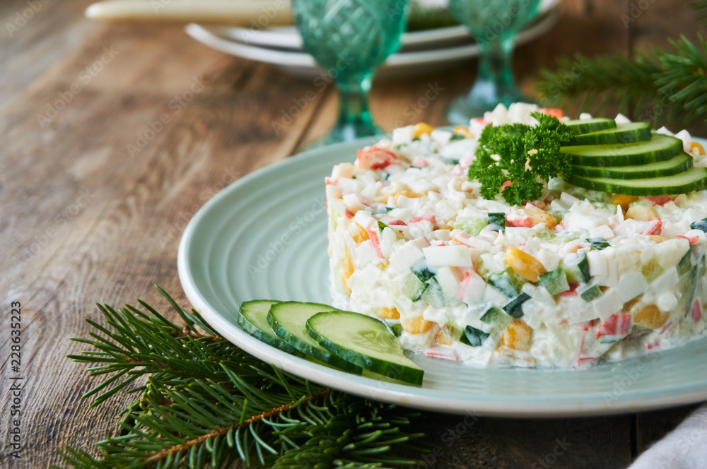Salad with crab sticks, vegetables, rice and eggs Salad with crab sticks, vegetables, rice and eggs