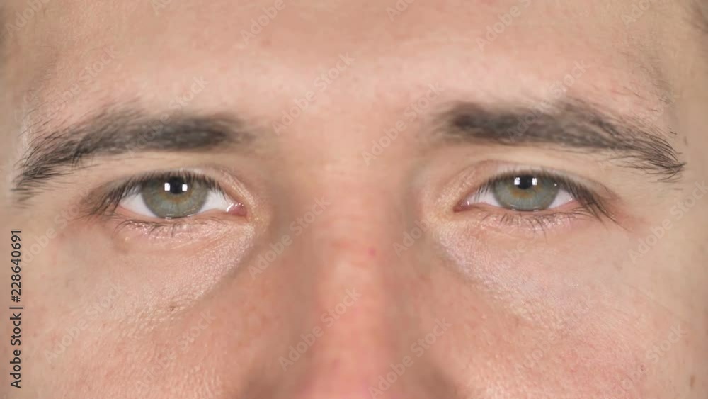 Close Up of Blinking Eyes of Businessman Close Up of Blinking Eyes of Businessman