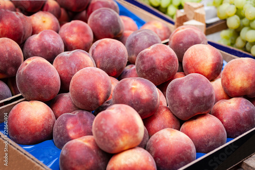 Ripe peaches in the fruit market, Catania, Sicily, Italy