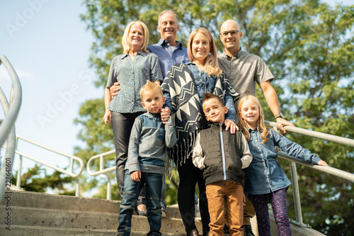 A nice multi generation family portrait outside