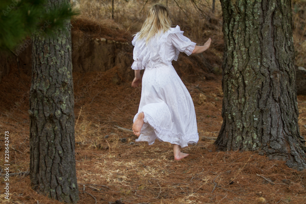 girl in white dress running away Stock Photo Adobe Stock