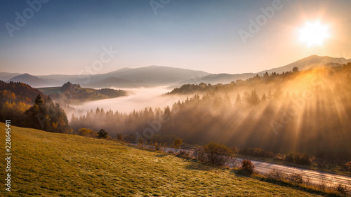 Autumn landscape, sunrise in a foggy morning in the region of Orava, Slovakia, Europe. © Viliam