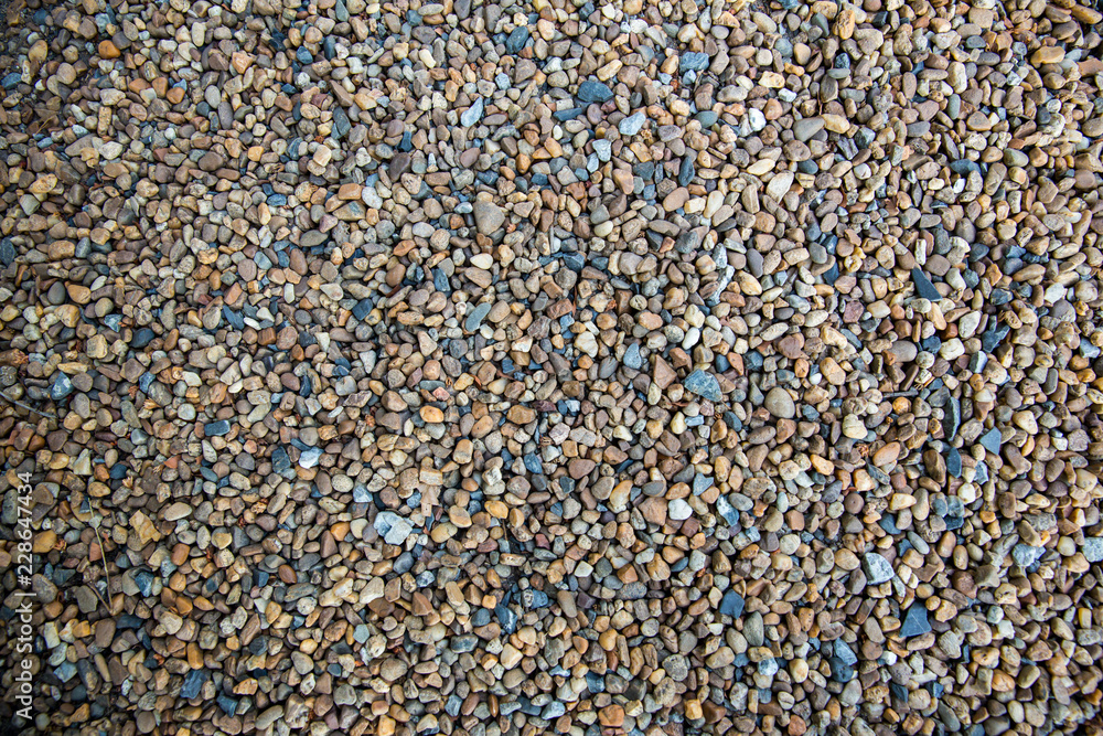 Sea pebbles. Small stones gravel texture background.Pile of pebbles, thailand.Color stone in background. Sea pebbles. Small stones gravel texture background.Pile of pebbles, thailand.Color stone in background.