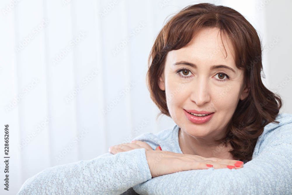 Portrait of smiling middle aged caucasian woman. Portrait of smiling middle aged caucasian woman.