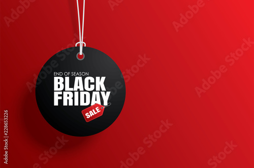 Black friday sale tag circle banner and the rope hanging on red background photo