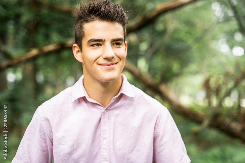 Portrait of a teenager outdoors in the forest
