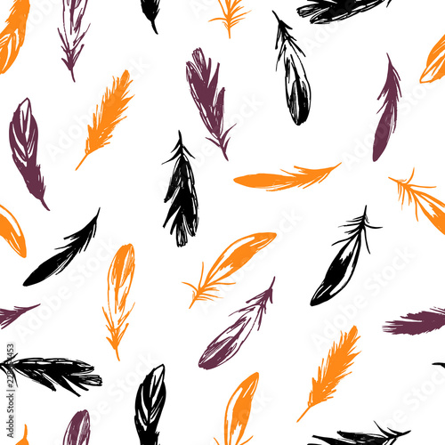 Halloween seamless pattern with feathers on a white background.