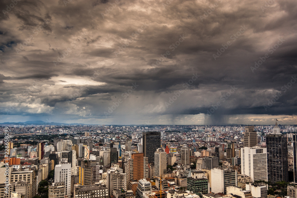 dramatic storm clouds over Sao Paulo skyline