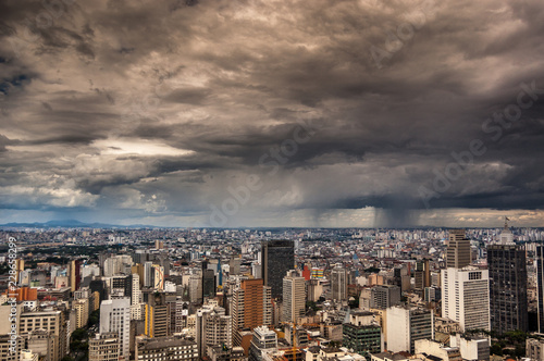 dramatic storm clouds over Sao Paulo skyline © Daniel Samray