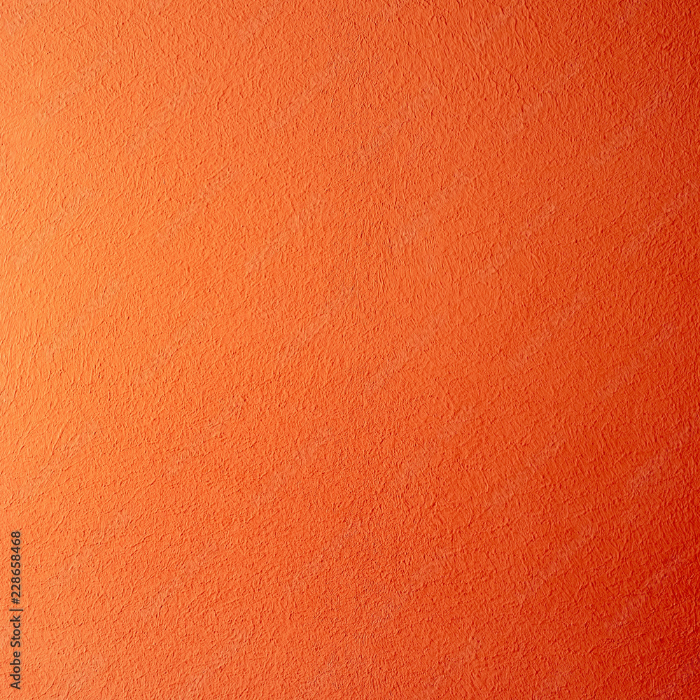 Fototapeta premium Abstract stucco red painted wall textured background