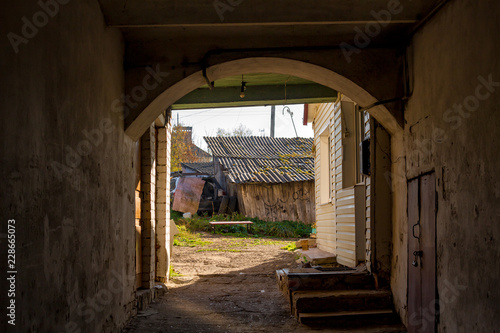 The passage into the courtyard inside the old house in the city of Borovsk, Russia. October 2018 