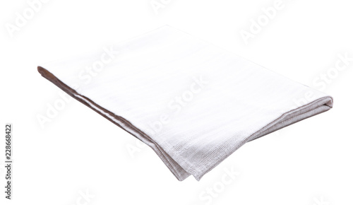 White kitchen towel isolated on white. Top view. photo