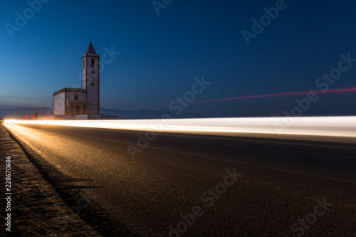 Wake of light in front of the church