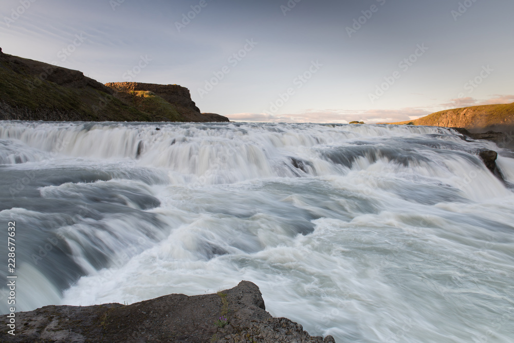 Amazing huge beautiful waterfall Gullfoss, famous landmark in Iceland, selective focus