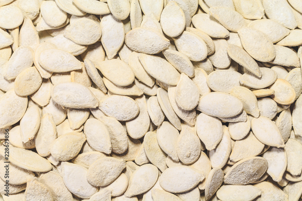 White pumpkin seeds fried close up White pumpkin seeds fried close up