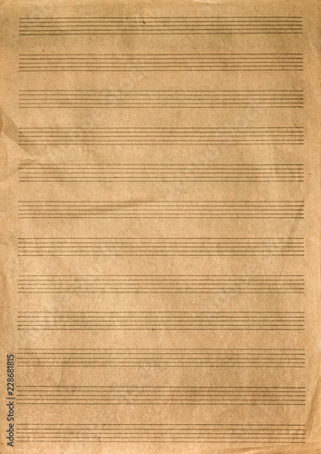 Old crumpled brown blank music sheet.