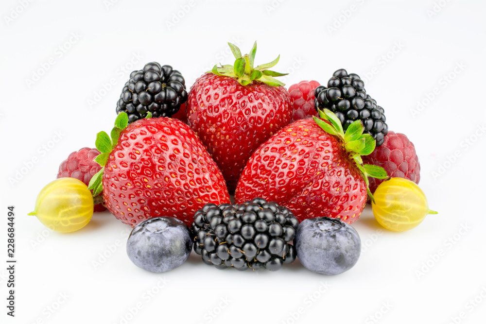 Obraz premium Different berries isolated on a white background.