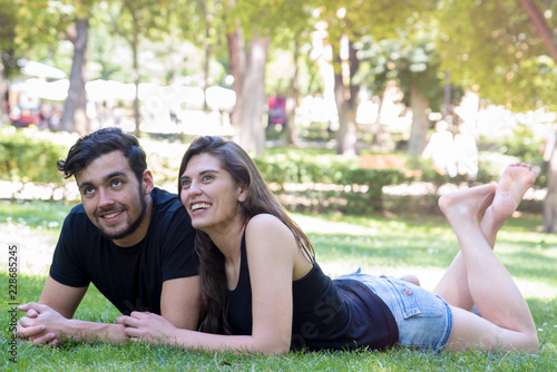 Young couple in love enjoy a sunny day in the park 