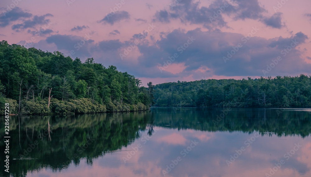 Julian Price Memorial Park, North Carolina, USA - June 14, 2018: Sunset at a lake in Julian Price Memorial Park National Park
