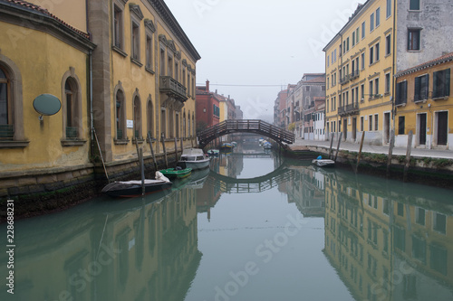 Picturesque spring view of Vennice with famous water canal and colorful houses. Splendid morning scene in Italy, Europe. Magnificent Mediterranean cityscape. Traveling concept background. photo