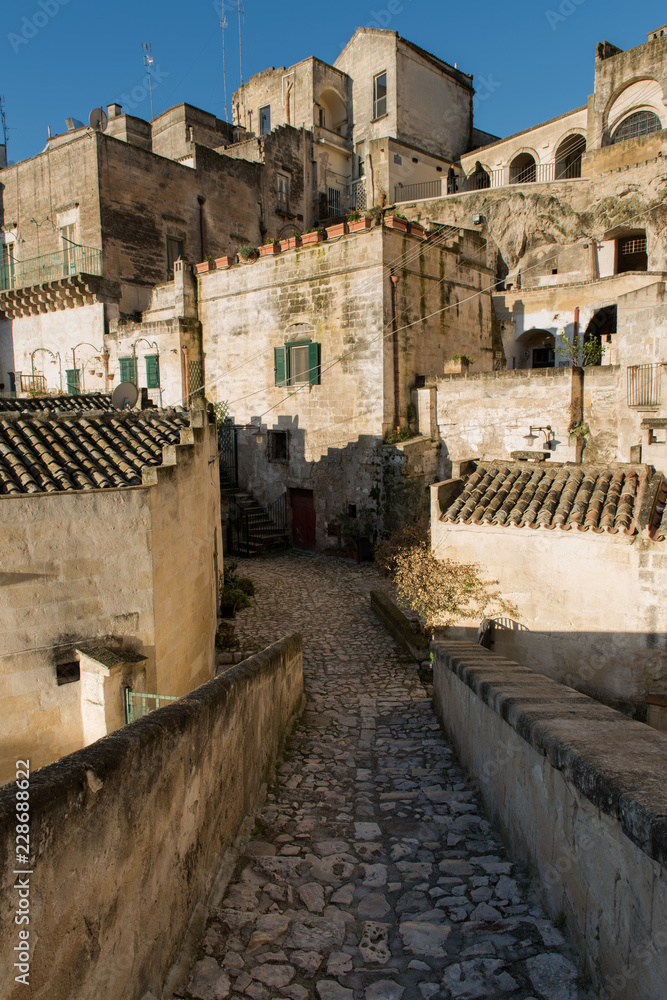 Matera, Basilicata, Italy: picturesque view of an ancient street in the old town 