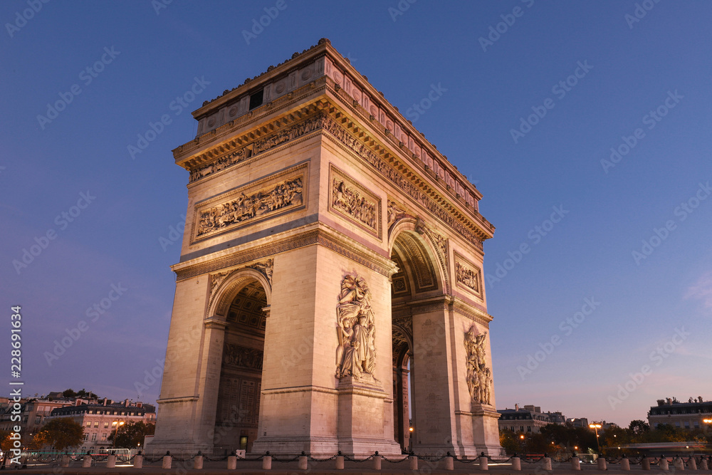 The Triumphal Arch in evening, Paris, France.