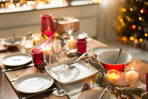 christmas  holidays and eating concept - table served for festive dinner at home
