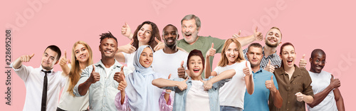 Happy business women and men with sign ok smiling isolated on trendy pink studio background. Beautiful half-length portrait. Emotional people. Human emotions, facial expression concept. Collage