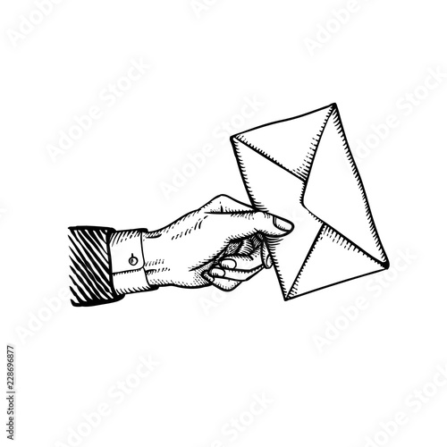 Engraved hand holding envelope