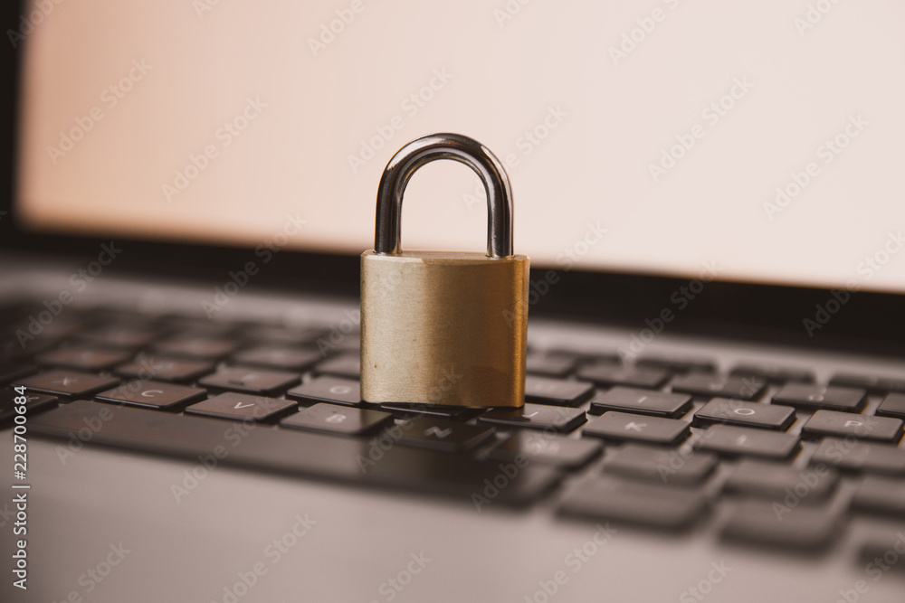 Padlock and Chain on a Laptop Padlock and Chain on a Laptop