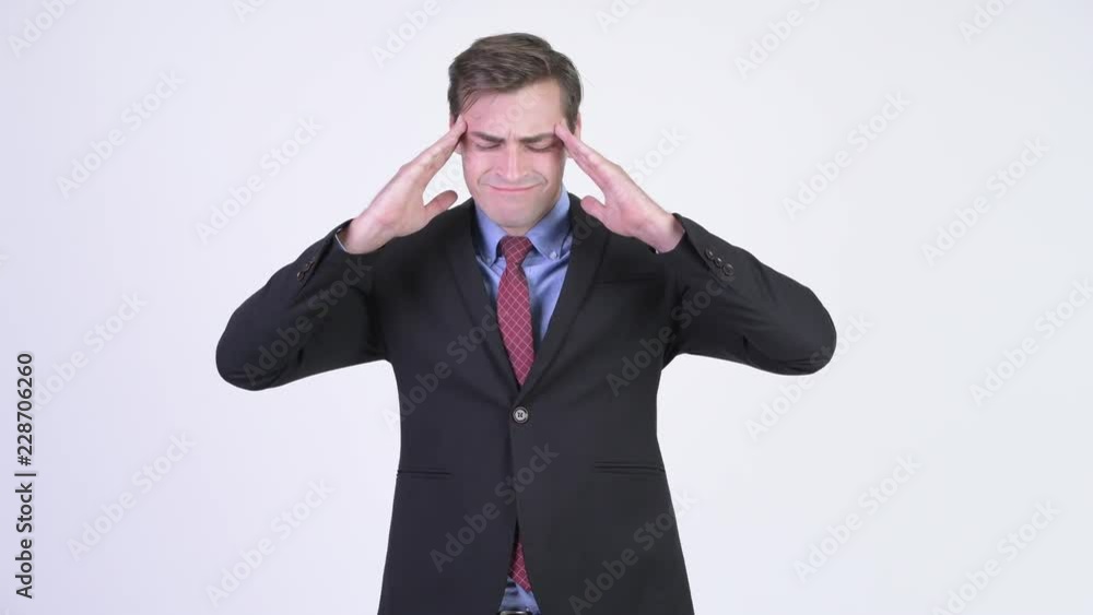 Young stressed businessman having headache Young stressed businessman having headache
