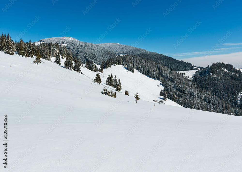 Winter snowy mountains, and lone farmhouse Winter snowy mountains, and lone farmhouse