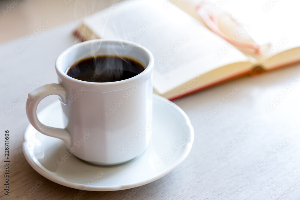 Reading and drink Coffee in the morning Reading and drink Coffee in the morning