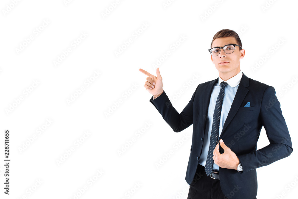 Portrait of successful businessman in suit pointing to empty copy space isolated on white background Portrait of successful businessman in suit pointing to empty copy space isolated on white background