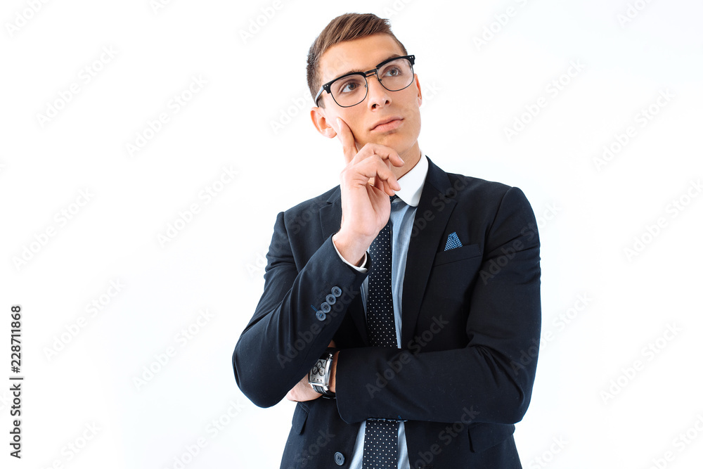 Brooding business man in glasses and suit isolated on white background Brooding business man in glasses and suit isolated on white background