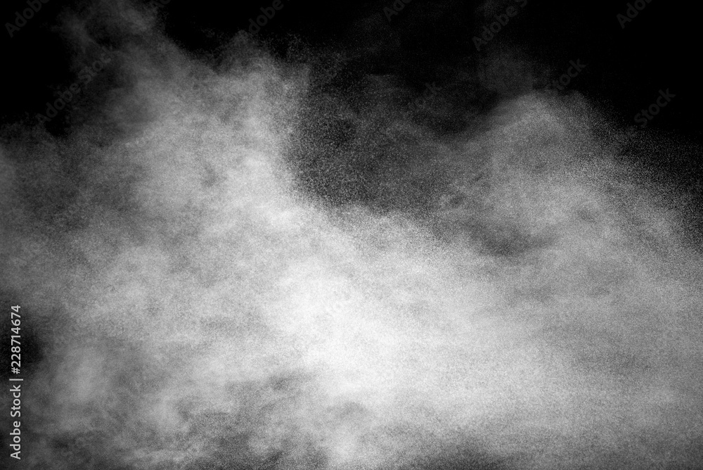 Explosion of white dust on black background. Explosion of white dust on black background.