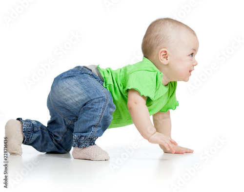 side view of baby crawling ...