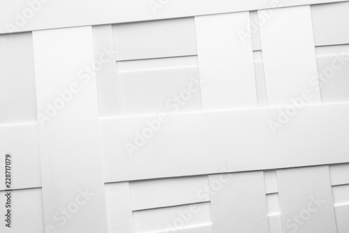 Low geometric composition with white elements, abstract background