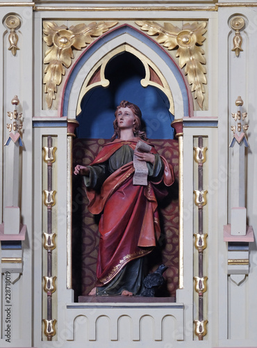 St. John the Evangelist statue on the pulpit in the church of Saint Matthew in Stitar, Croatia 