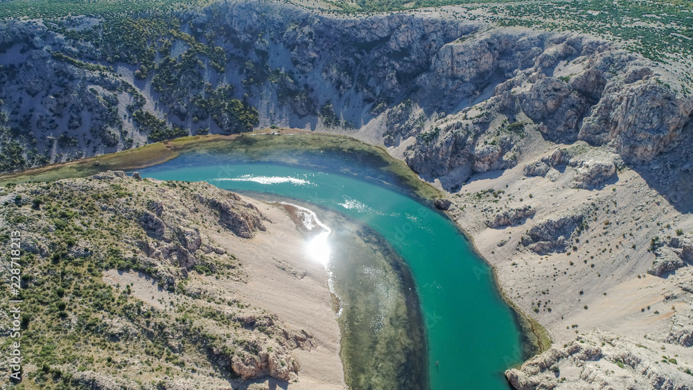 Zrmanja River in northern Dalmatia, Croatia is famous for its crystal clear waters and countless waterfalls surrounded by a deep canyon. This was a site of winnetou filming.