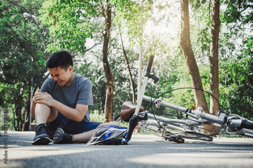 Boy injury hurts from falling bike, hurt on his arms, pain ache from