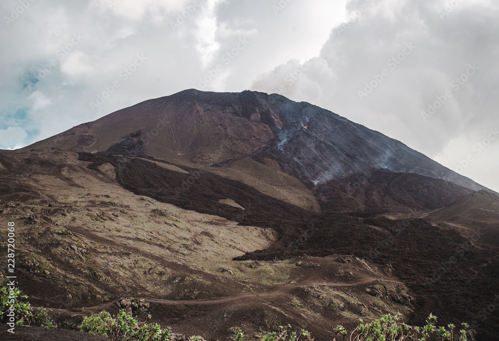 Small volcanic rock and lava flow down Pacaya Volcano, one of Guatemala's most active volcanoes