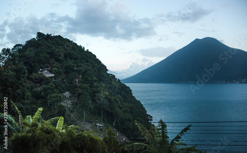 View over the lush and blue landscape around Lake Atitlán, Guatemala