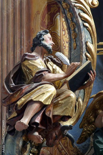 Saint Luke the Evangelist statue on the altar in the Baroque Church of Our Lady of the Snow in Belec, Croatia