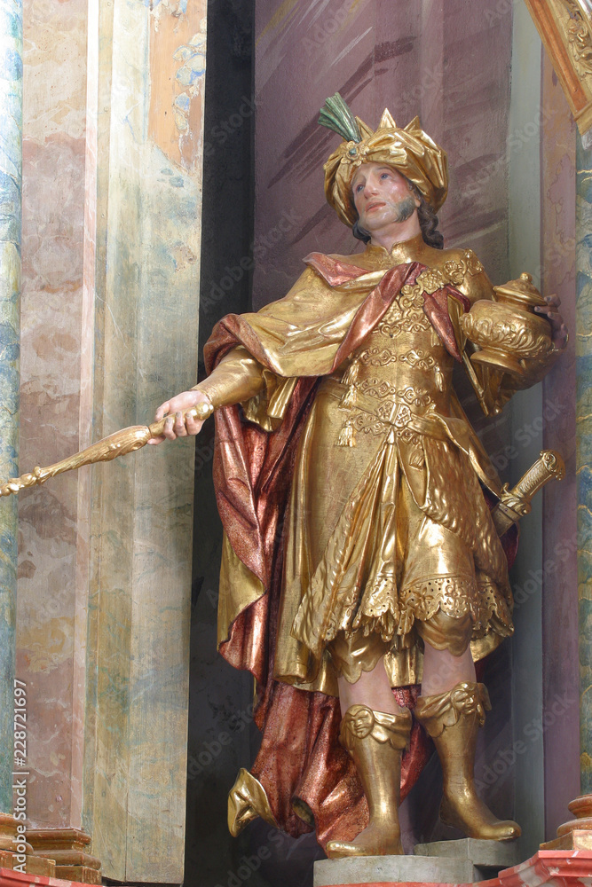 Fototapeta premium Biblical Magi Gaspar statue on the altar in the Baroque Church of Our Lady of the Snow in Belec, Croatia