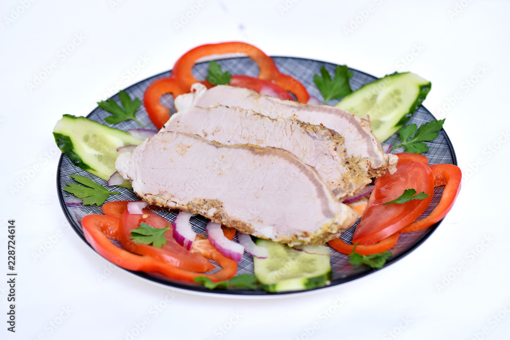 Sliced ham for the holiday. Baked ham with vegetables. Sliced ham for the holiday. Baked ham with vegetables.