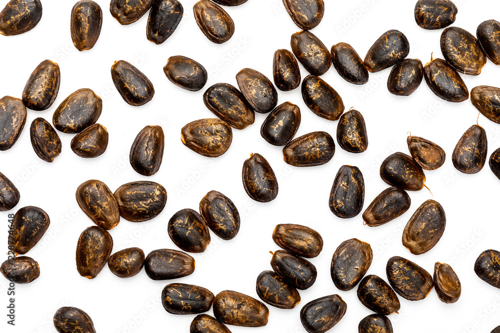 Fototapeta premium Chirimoya nuggets (seeds). Texture on white background